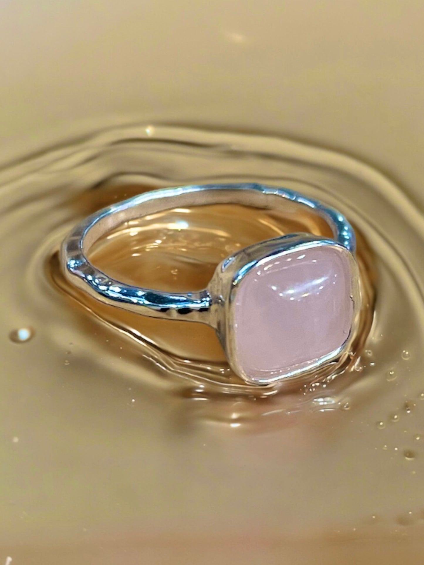 Cushion Cut Rose Quartz Sterling Silver Ring - More rings, bracelets, necklaces, earrings, anklets, charms, chains and toe rings in a variety of shapes, sizes and styles like geometric, cocktail, statement, bands, spinner, spoon, layered, long, collar, choker, climber, cuff, bangle, stretch, single, double, triple a or multi strands, beaded, curb, wheat, rope, Figaro, cable chains and more at Sparks and Gem
