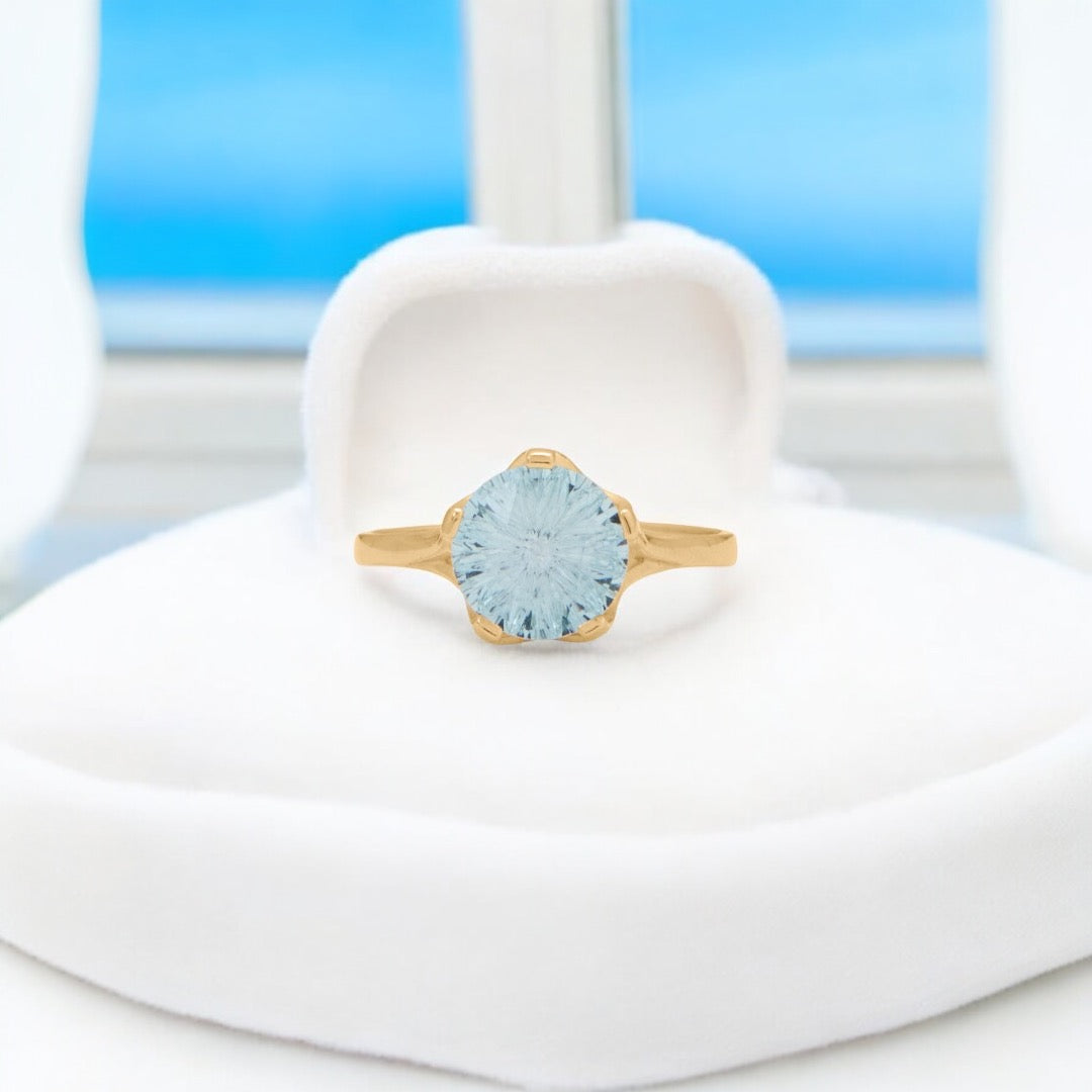 14 Karat Yellow Gold Precision Cut Sky Blue Topaz Ring
